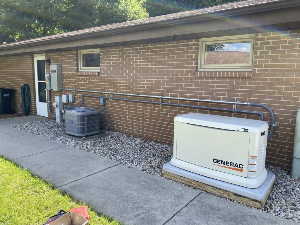 New Generac generator installed behind a Jackson, WI, home. 